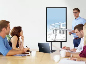 Group of architects reviewing CAD drawing on screen