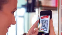 Person scanning QR code