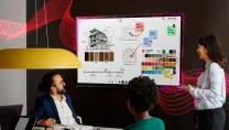 Group of people having a meeting with a Sharp Display