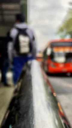 Out of focus buses and bus stop