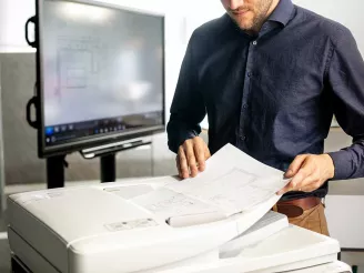 Man using all in one printer