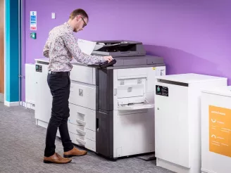 Man using office printer