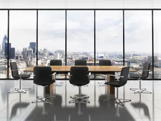 Executive desk in London meeting room with chairs 