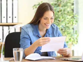 Woman reading letter - Hybrid Mail