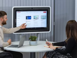 interactive touch screen table being used in a meeting for collaboration