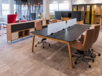 Modern office furniture in an open plan office space with breakout spaces