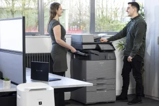 Staff using multifunction printer