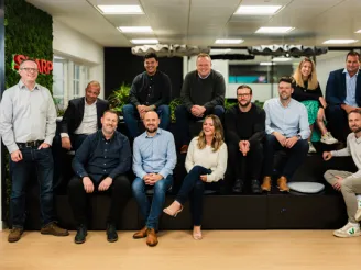 group of people working at sharp office