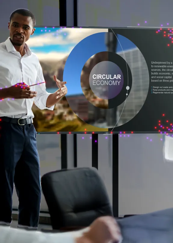 Three people having a meeting, looking at a Sharp Audio Visual