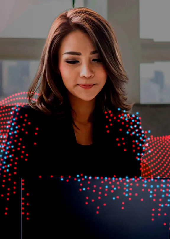 Woman typing on a laptop