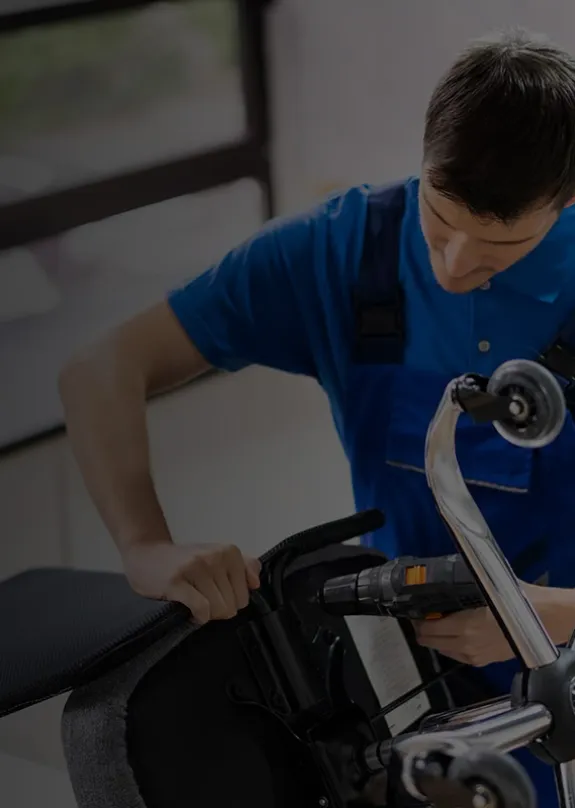 person installing office furniture