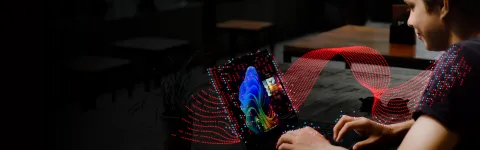 Boy typing on a computer