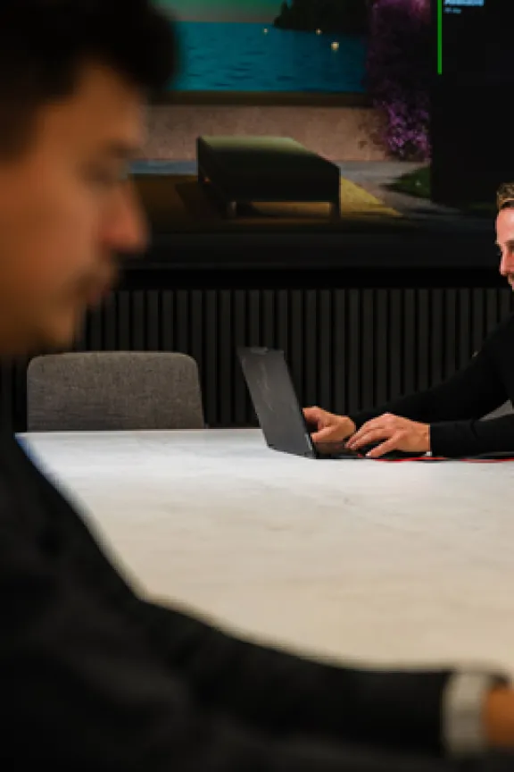 two people working at desk